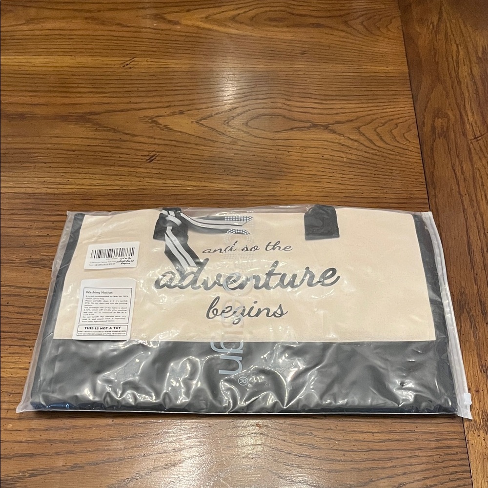 Adventure Begins Tote Bag